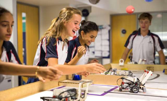 Enthusiastic Students Enjoying Robotics Activities | Stamford American International School