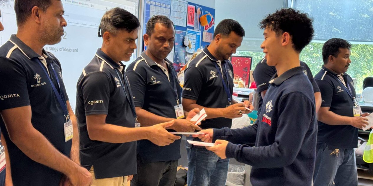 Stamford American Internal School (SAIS) students volunteer work with migrant workers in SIngapore